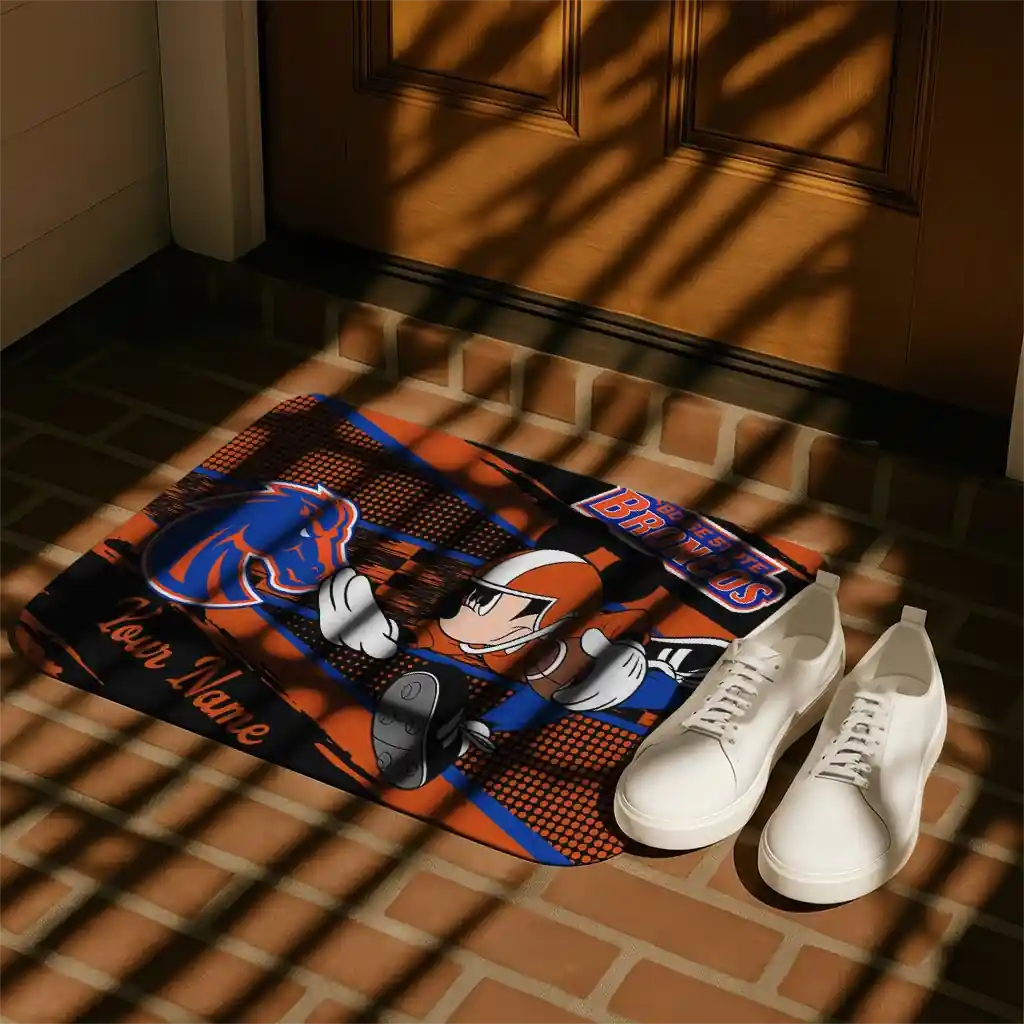 personalized-boise-state-broncos-mickey-quarterback-orange-black-doormat-trendy.webp