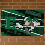 personalized-eastern-michigan-eagles-mickey-quarterback-green-black-doormat-best-selling.webp