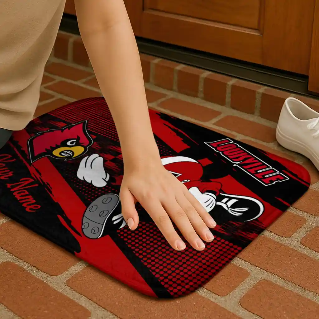 personalized-louisville-cardinals-mickey-quarterback-red-black-doormat-premium-grade.webp