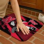 personalized-nebraska-cornhuskers-mickey-quarterback-red-black-doormat-best-selling.webp
