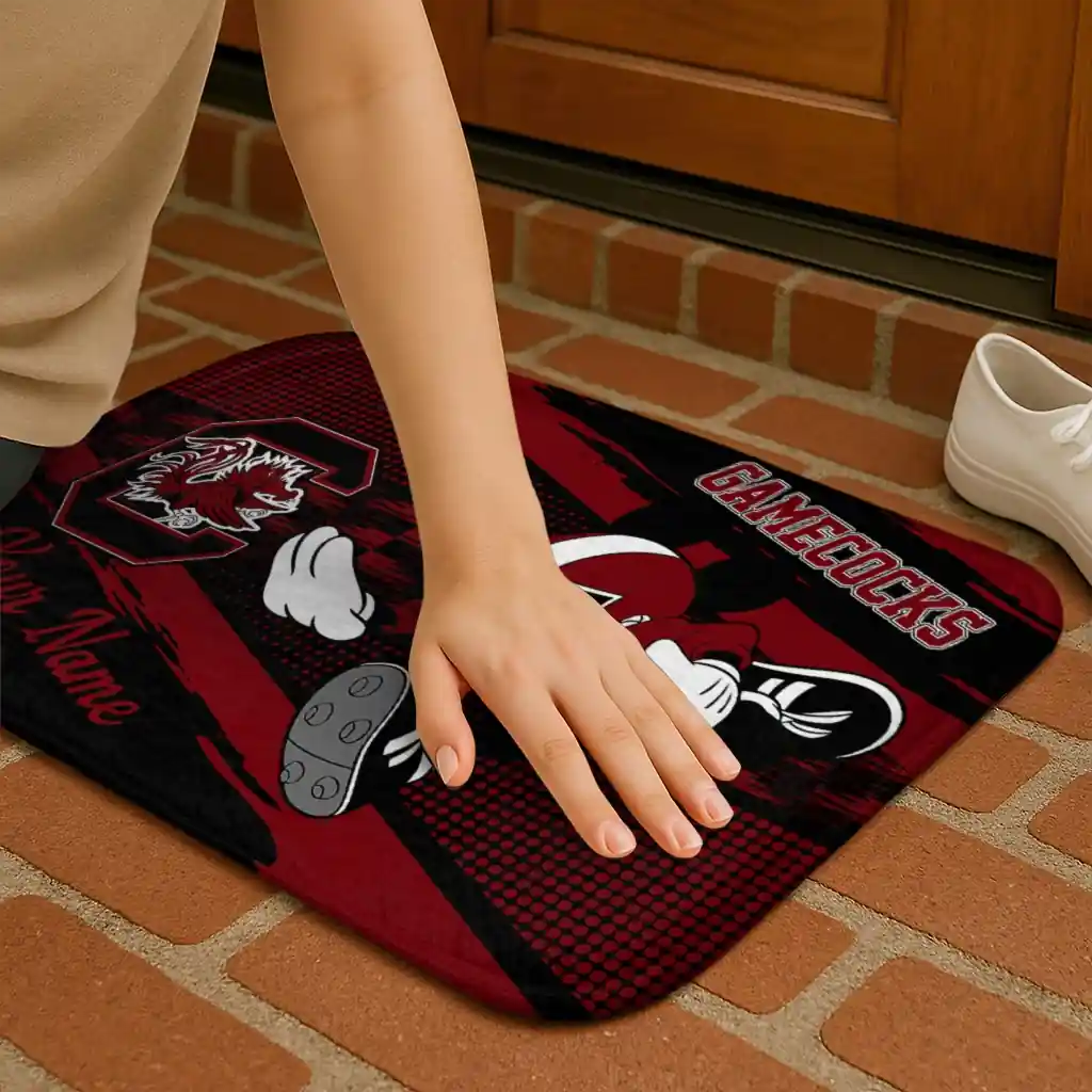 personalized-south-carolina-gamecocks-mickey-quarterback-garnet-black-doormat-premium-grade.webp