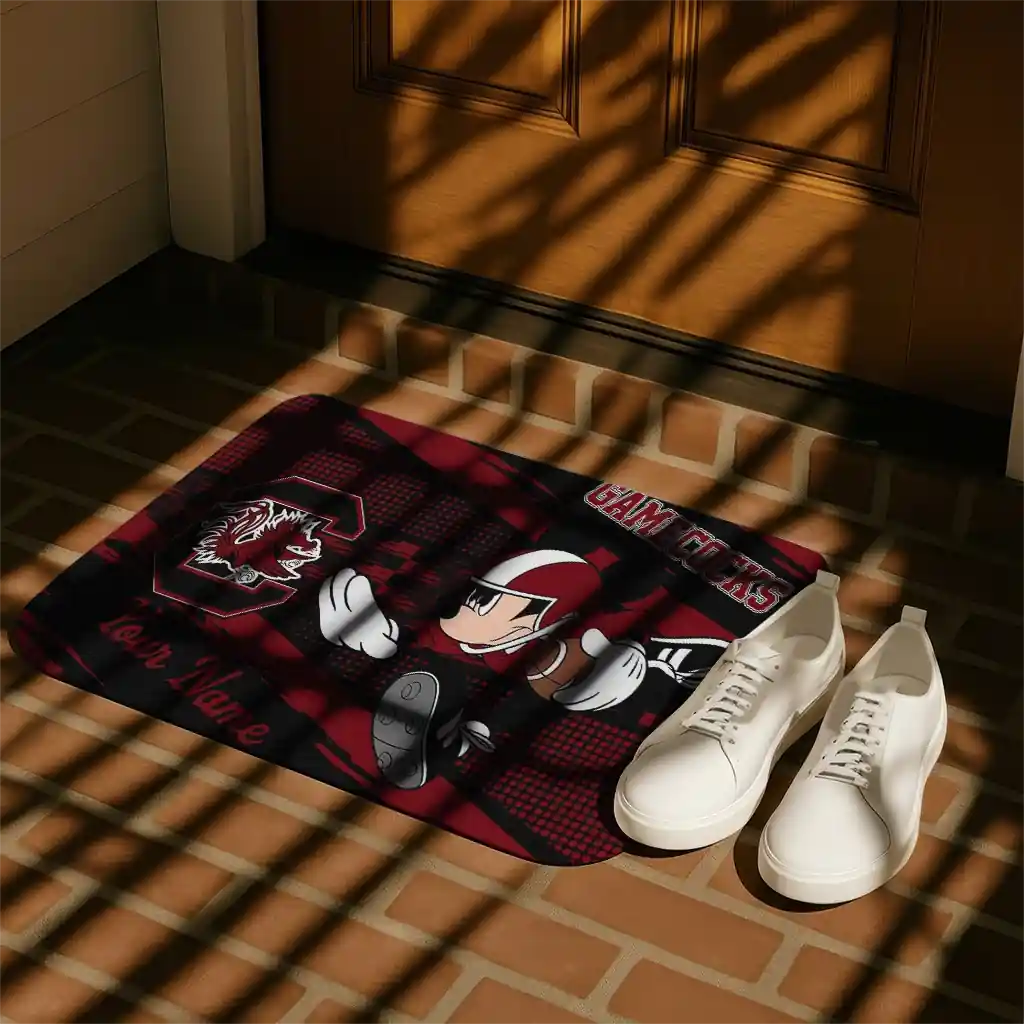 personalized-south-carolina-gamecocks-mickey-quarterback-garnet-black-doormat-trendy.webp