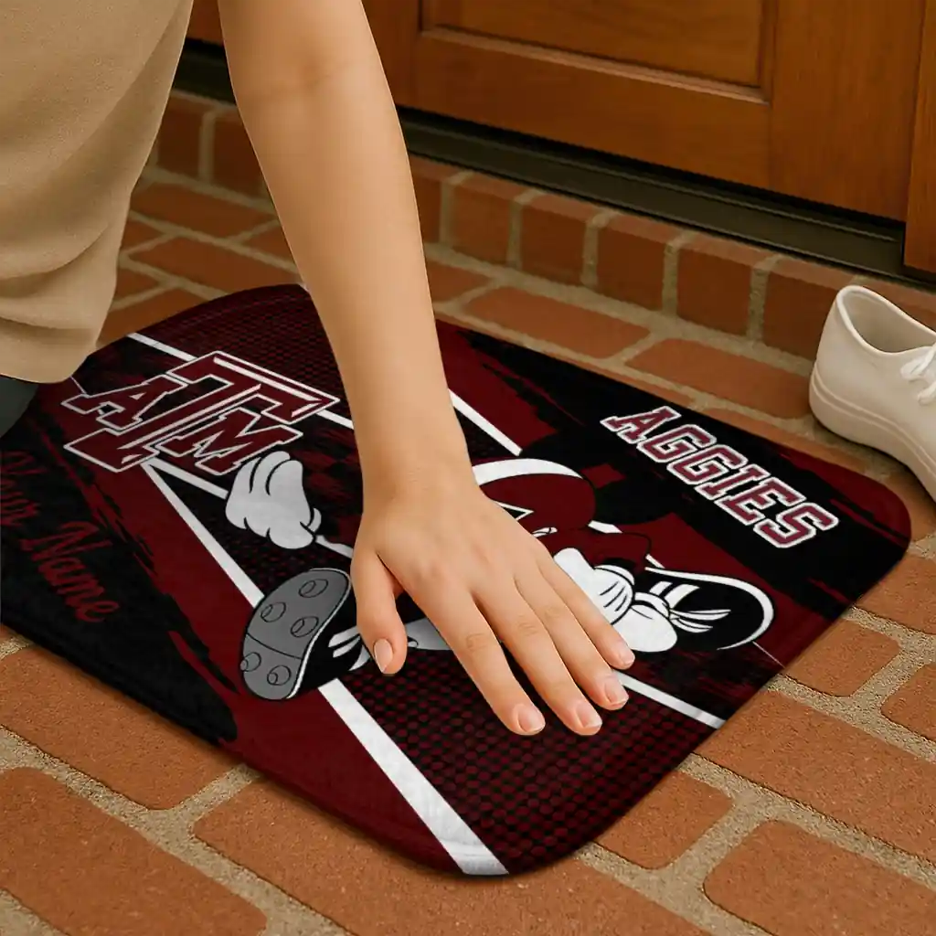 personalized-texas-am-aggies-mickey-quarterback-maroon-black-doormat-premium-grade.webp