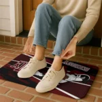 personalized-texas-am-aggies-mickey-quarterback-maroon-black-doormat-best-selling.webp