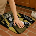 personalized-ucf-knights-mickey-quarterback-gold-black-doormat-best-selling.webp