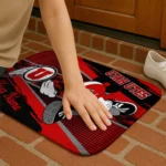 personalized-utah-utes-mickey-quarterback-red-black-doormat-best-selling.webp