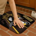 personalized-wyoming-cowboys-mickey-quarterback-brown-black-doormat-best-selling.webp