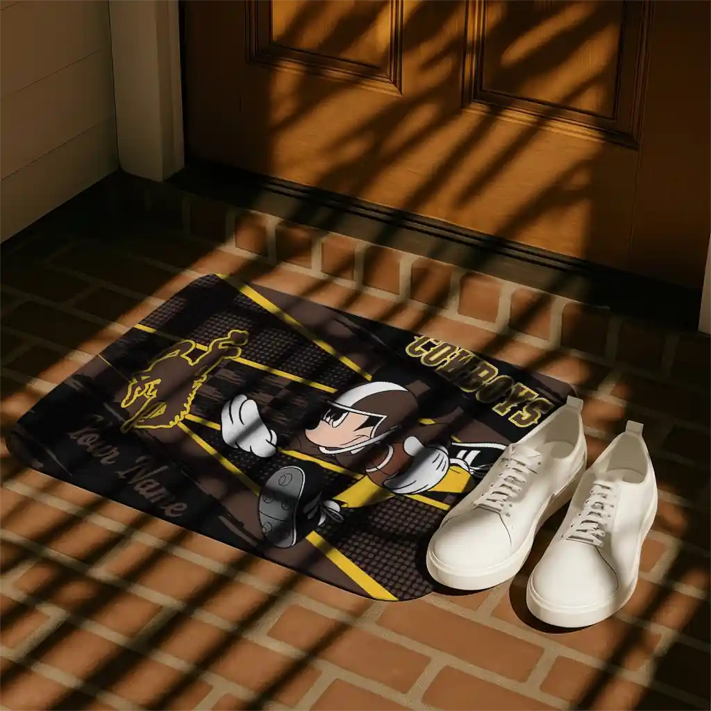 personalized-wyoming-cowboys-mickey-quarterback-brown-black-doormat-trendy.webp