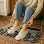 purdue-boilermakers-tribal-detailing-gold-black-doormat-best-selling.webp