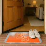 sam-houston-bearkats-pixel-blur-orange-doormat-best-selling.webp