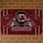 south-carolina-gamecocks-helmet-illustration-garnet-doormat-best-selling.webp