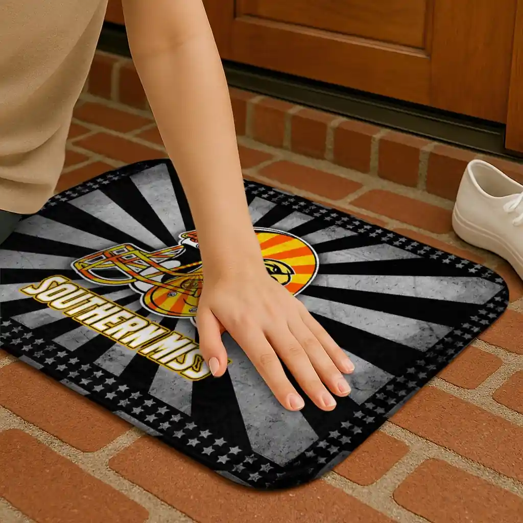 southern-miss-golden-eagles-helmet-centerpiece-black-doormat-premium-grade.webp