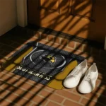 southern-miss-golden-eagles-hexagon-oval-black-doormat-best-selling.webp
