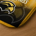 southern-miss-golden-eagles-pixel-blur-black-doormat-best-selling.webp
