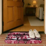 temple-owls-palm-silhouette-red-black-doormat-best-selling.webp