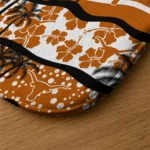 texas-longhorns-palm-silhouette-orange-black-doormat-best-selling.webp