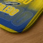 toledo-rockets-pixel-blur-blue-doormat-best-selling.webp