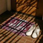 troy-trojans-helmet-illustration-red-doormat-best-selling.webp