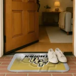 ucf-knights-pixel-blur-gold-doormat-best-selling.webp