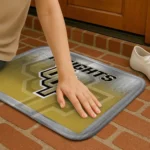 ucf-knights-pixel-blur-gold-doormat-best-selling.webp