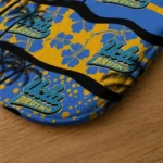 ucla-bruins-palm-silhouette-blue-black-doormat-best-selling.webp