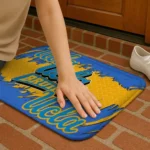 ucla-bruins-plate-rip-blue-doormat-best-selling.webp