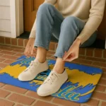 ucla-bruins-plate-rip-blue-doormat-best-selling.webp