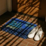 ucla-bruins-tribal-detailing-blue-black-doormat-best-selling.webp