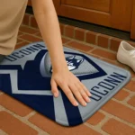 uconn-huskies-ninja-mesh-blue-doormat-best-selling.webp