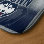 uconn-huskies-pixel-blur-blue-doormat-best-selling.webp