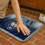 uconn-huskies-pixel-blur-blue-doormat-best-selling.webp
