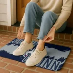 uconn-huskies-plate-rip-blue-doormat-best-selling.webp