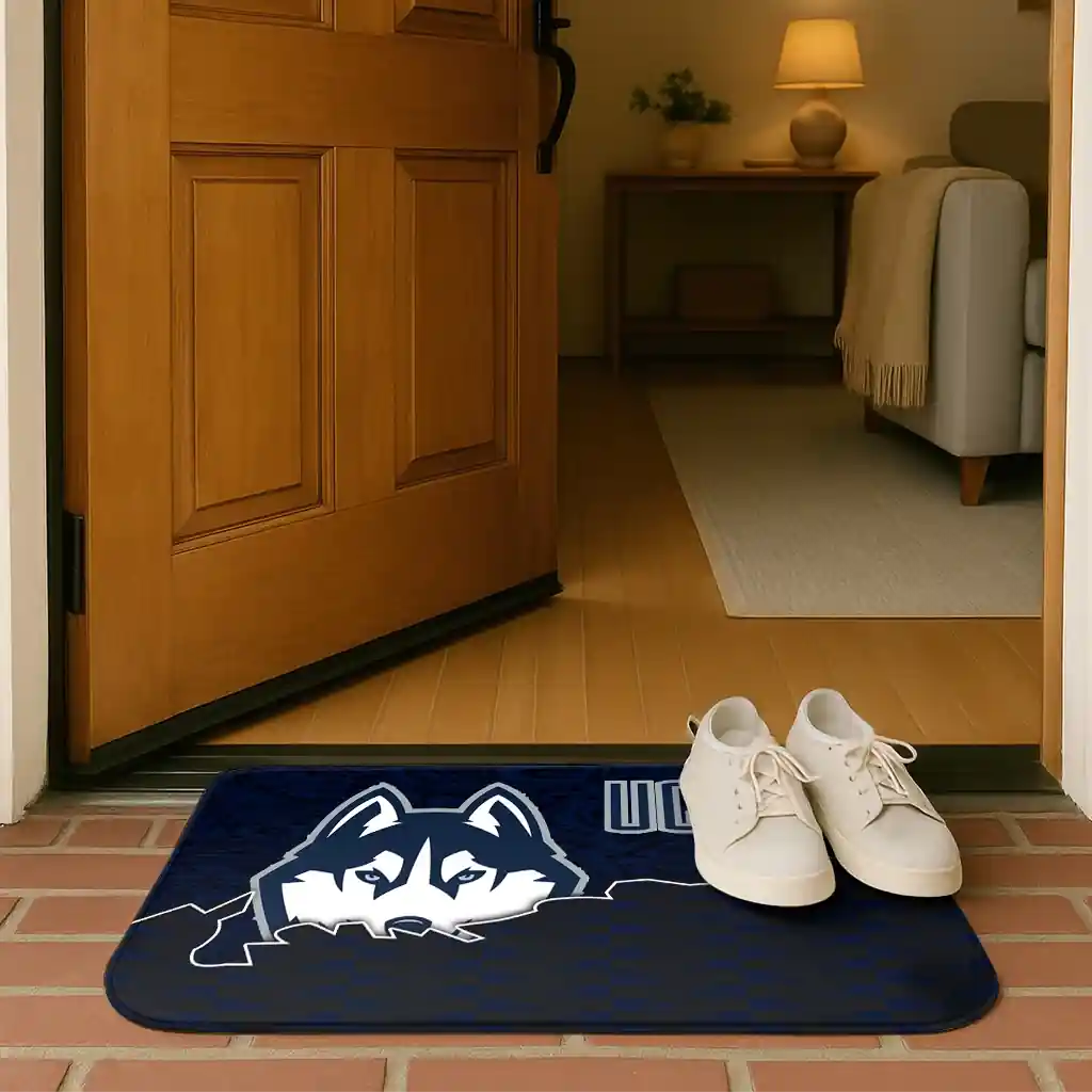 uconn-huskies-tribal-detailing-blue-black-doormat-fashion-forward.webp