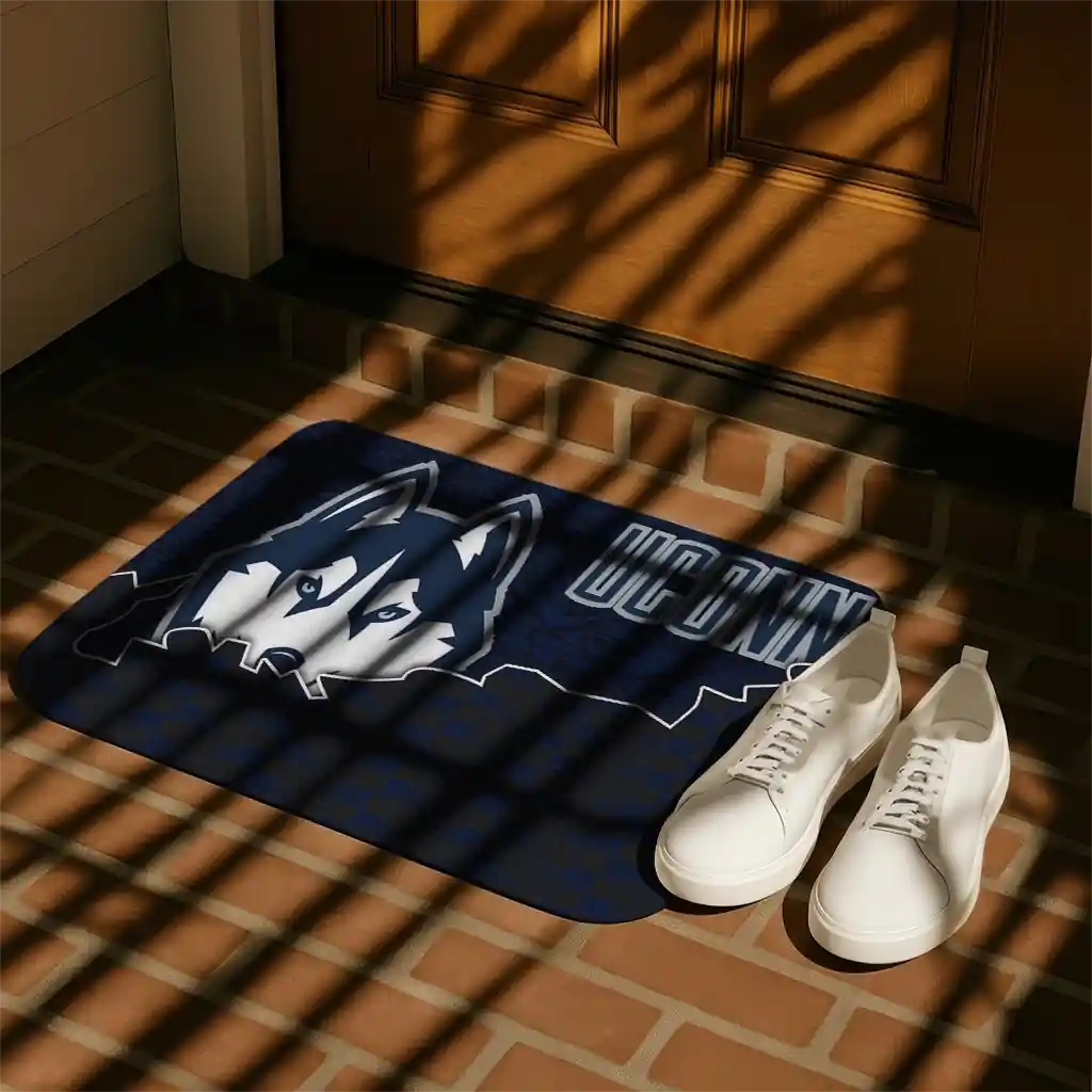 uconn-huskies-tribal-detailing-blue-black-doormat-trendy.webp