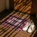 umass-minutemen-helmet-illustration-red-doormat-best-selling.webp