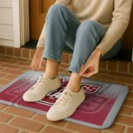 umass-minutemen-pixel-blur-red-doormat-best-selling.webp