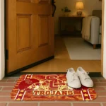 usc-trojans-helmet-illustration-red-doormat-best-selling.webp