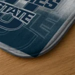 utah-state-aggies-pixel-blur-navy-doormat-best-selling.webp