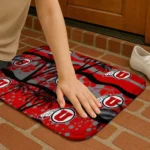 utah-utes-palm-silhouette-red-black-doormat-best-selling.webp