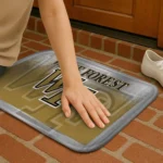 wake-forest-demon-deacons-pixel-blur-gold-doormat-best-selling.webp