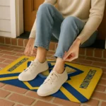 west-virginia-mountaineers-ninja-mesh-blue-doormat-best-selling.webp
