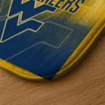 west-virginia-mountaineers-pixel-blur-blue-doormat-best-selling.webp