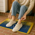 west-virginia-mountaineers-pixel-blur-blue-doormat-best-selling.webp