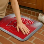 wisconsin-badgers-pixel-blur-red-doormat-best-selling.webp